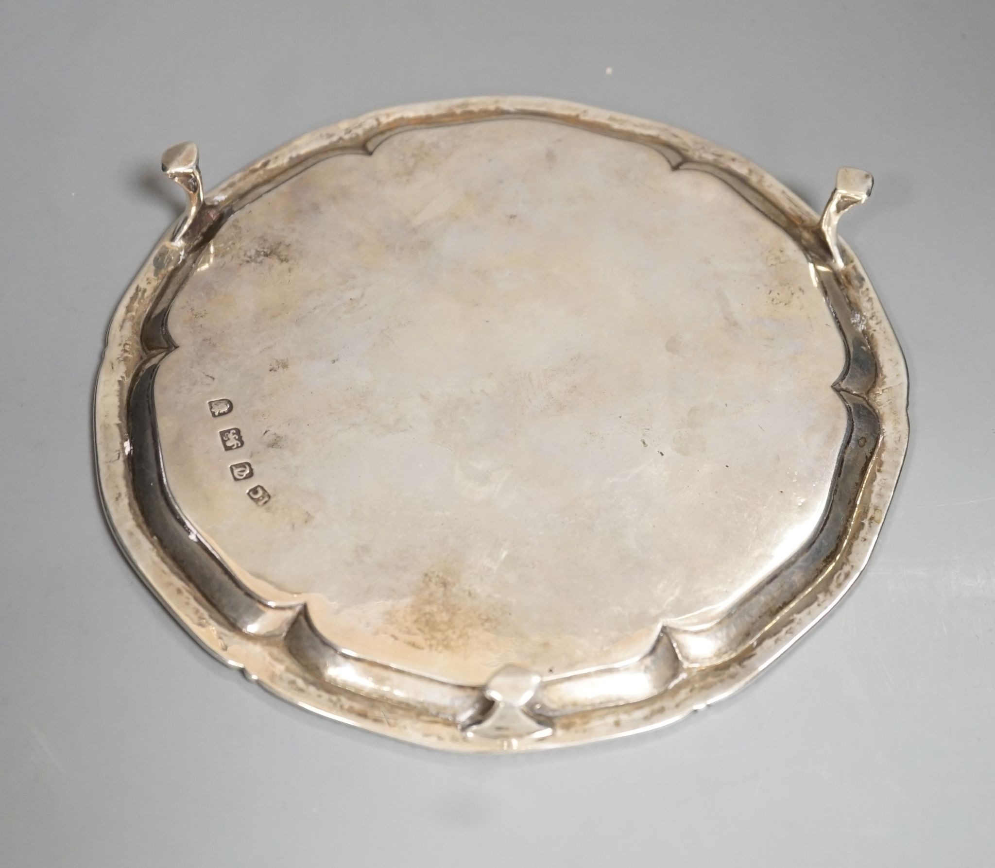 A George III silver waiter, on three claw feet, John Chapman II, London, 1774, 17.9cm, 8oz (repair).